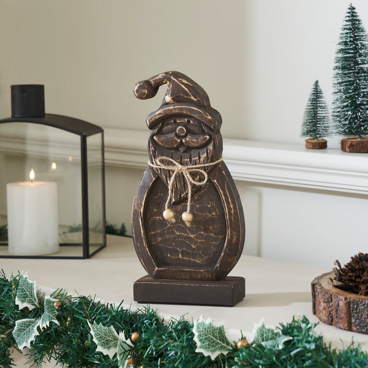 Rustic Cheer Dark Wooden Santa 11x5.5x2