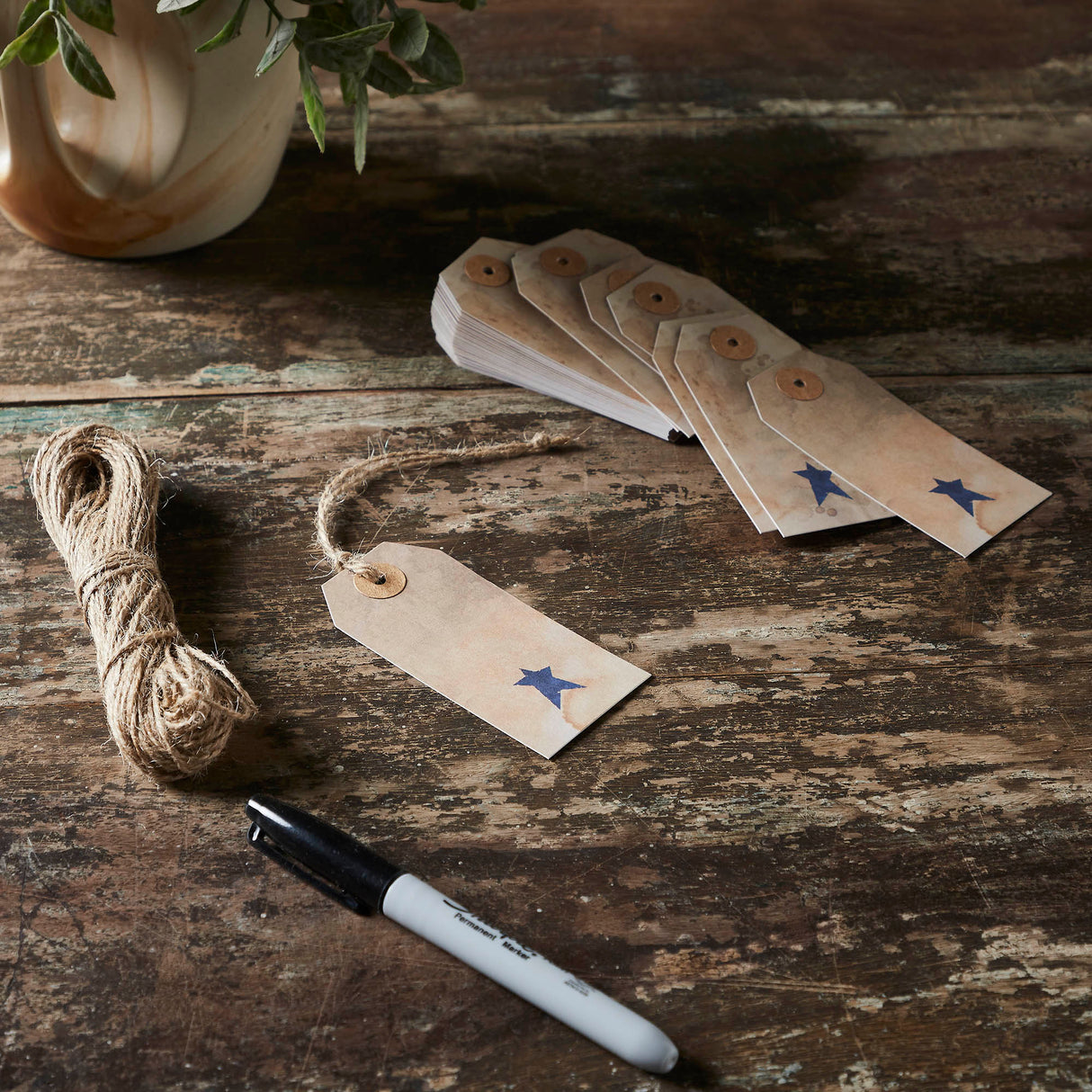 85084-Primitive-Star-Tea-Stained-Paper-Tag-Navy-3.75x1.75-w/-Twine-Set-of-50-image-1